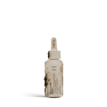 Dulcie Algae Plump Serum 30 mL bottle in shown in a decomposed state to illustrate material breakdown