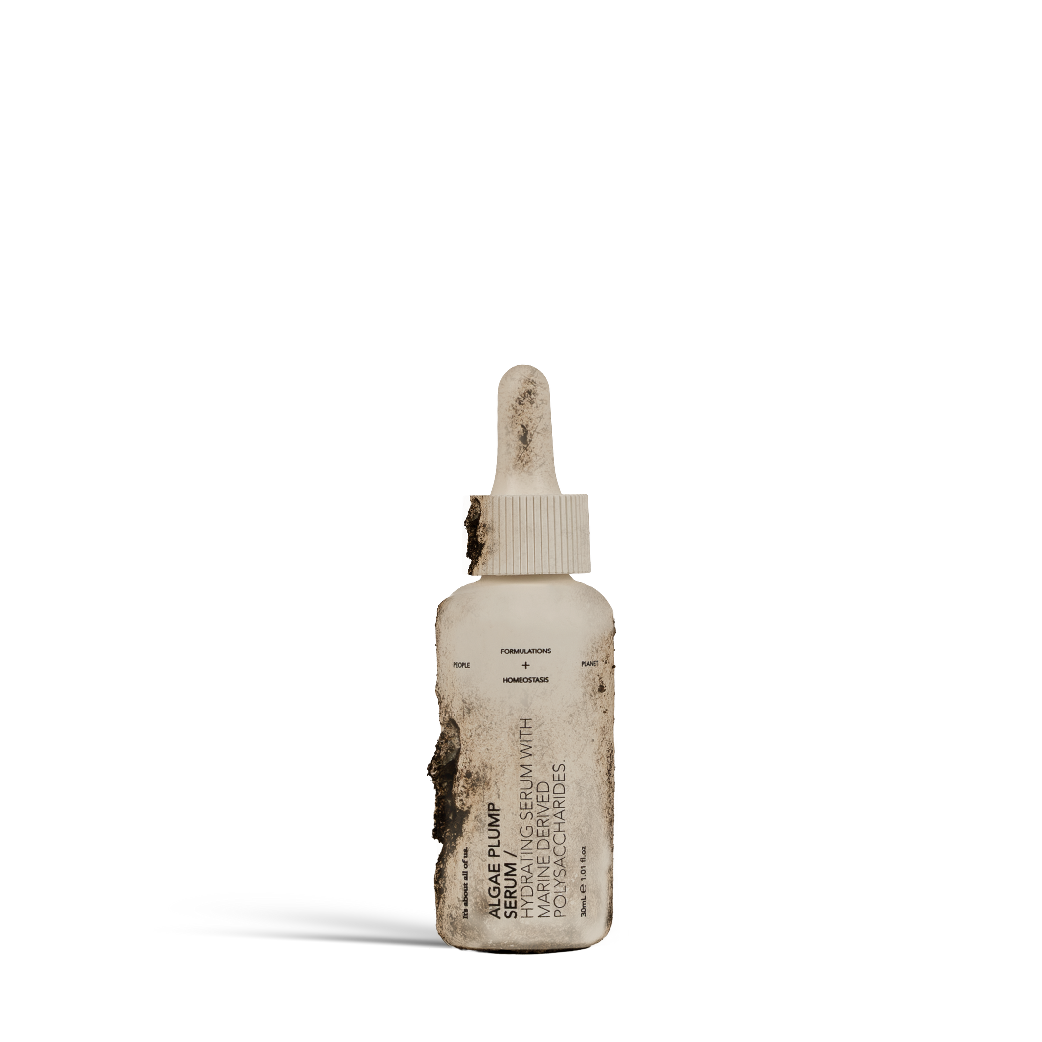 Dulcie Algae Plump Serum 30 mL bottle in shown in a decomposed state to illustrate material breakdown