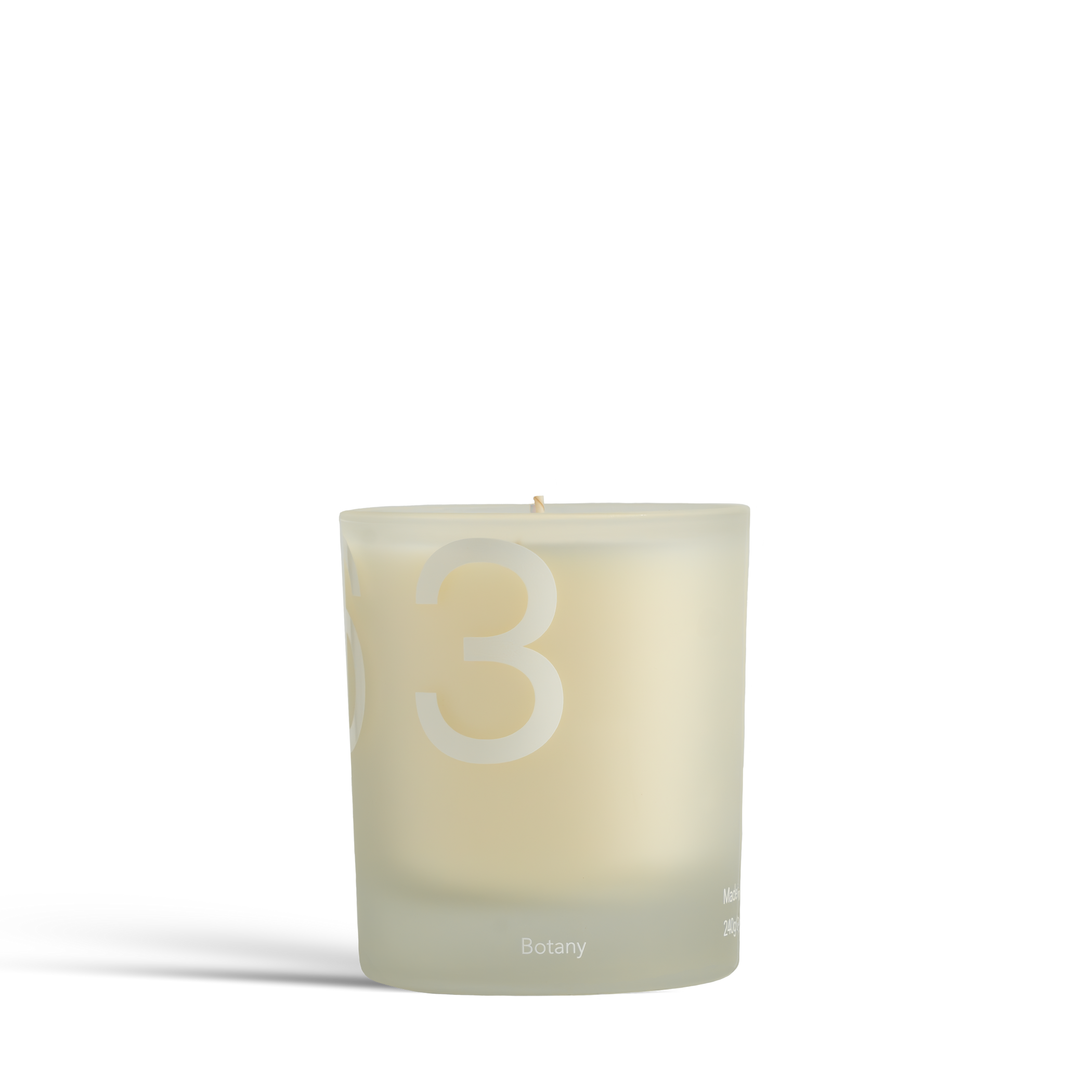 Dulcie Botany 240mL candle, off white wax in frosted clear glass labelled 26 3 E 