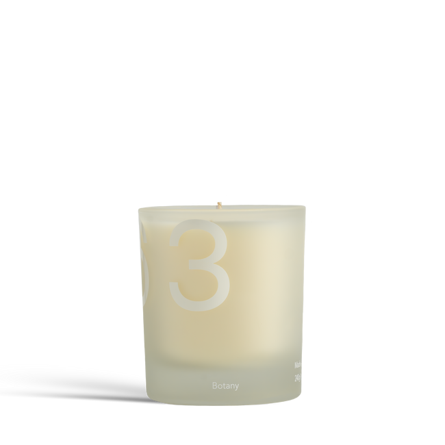 Dulcie Botany 240mL candle, off white wax in frosted clear glass labelled 26 3 E 