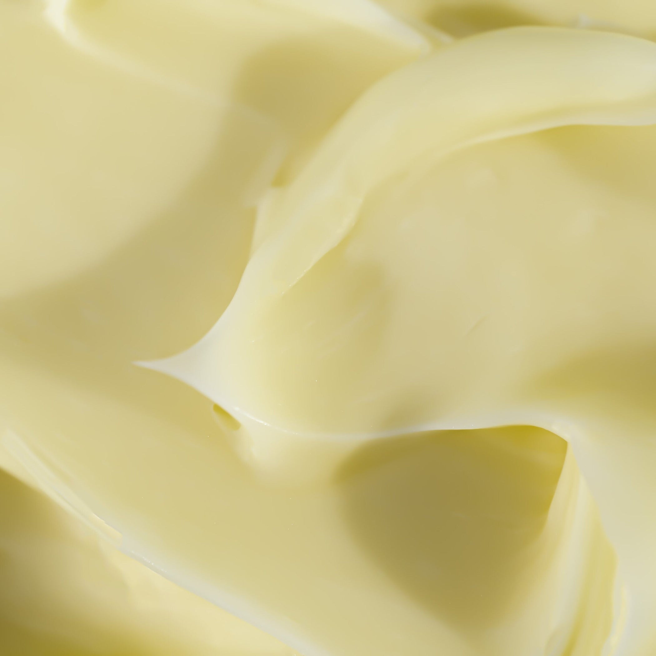 Close-up of yellow cream texture 