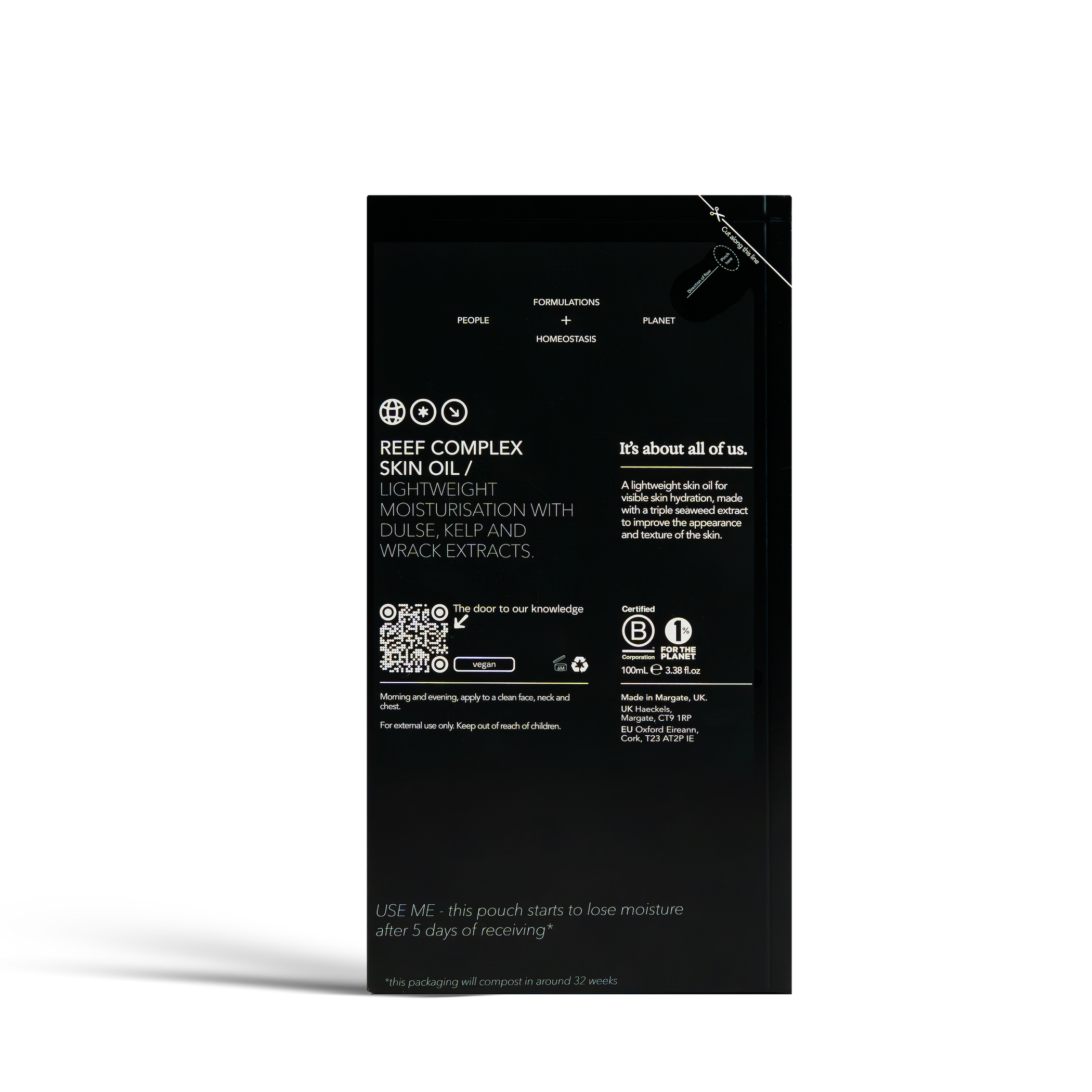 Dulcie Reef Complex Skin Oil 100mL in black paper packaging with white text detailing the product information